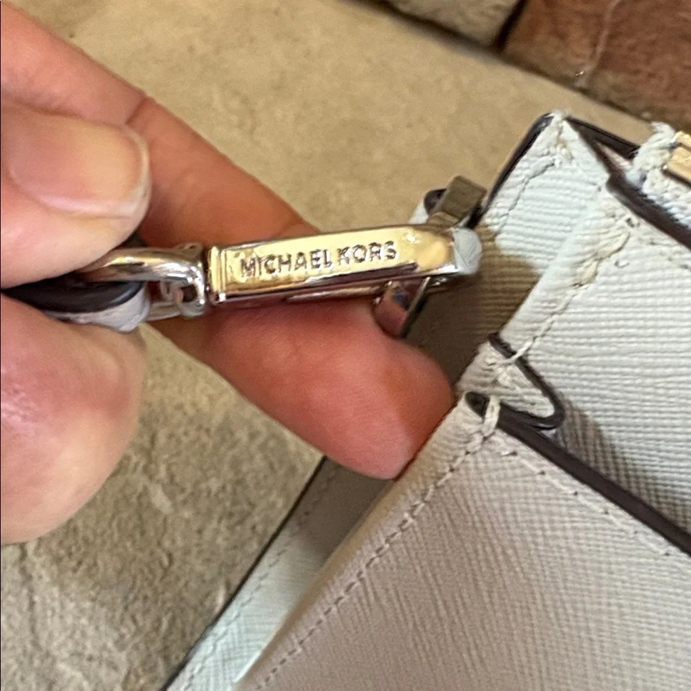 Michael Kors light grey wristlet/wallet
